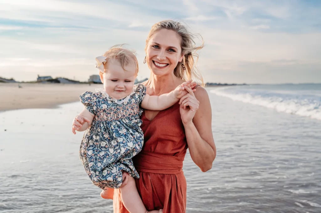 Plymouth Family Photographer Caryn Scanlan photographed this mom and her baby at a family photoshoot on a beach on the South Shore near Plymouth, MA