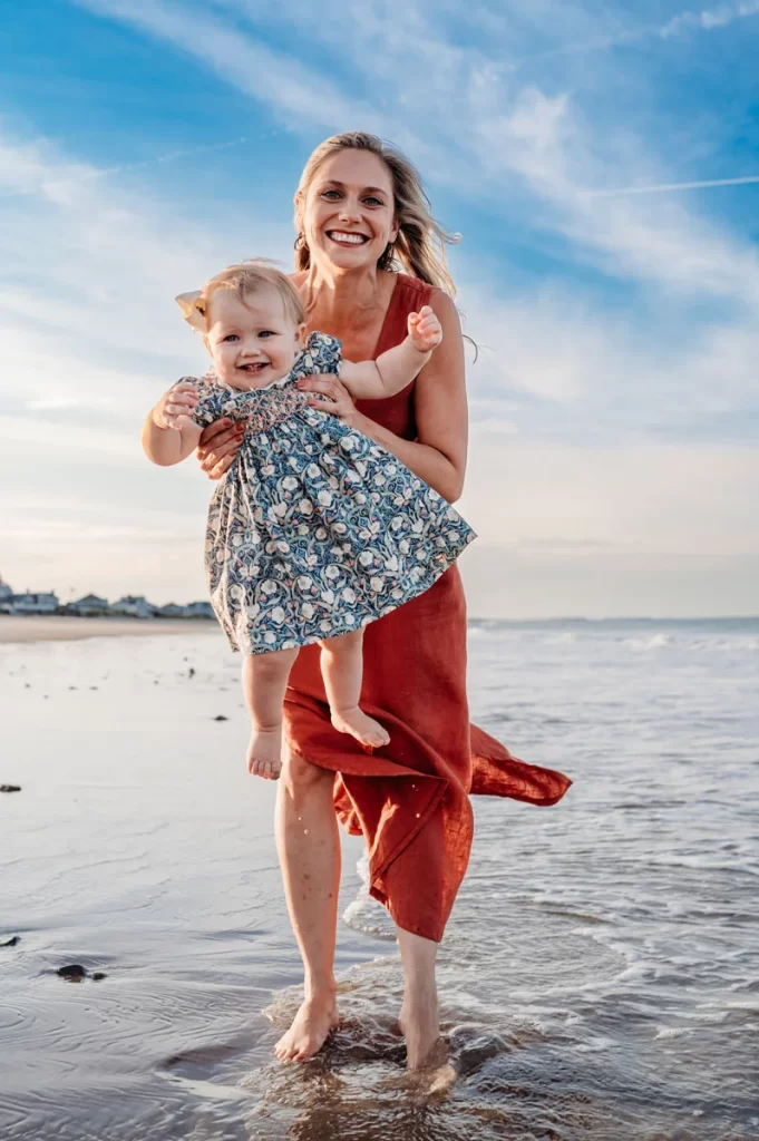 Plymouth Family Photographer Caryn Scanlan photographed this mom and her baby at a family photoshoot on a beach on the South Shore near Plymouth, MA