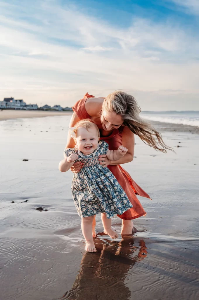 Plymouth Family Photographer Caryn Scanlan photographed this mom and her baby at a family photoshoot on a beach on the South Shore near Plymouth, MA