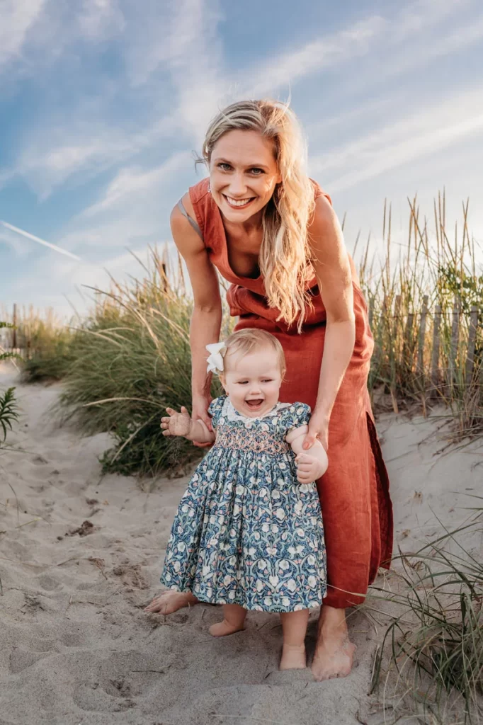 Plymouth Family Photographer Caryn Scanlan photographed this mom and her baby at a family photoshoot on a beach on the South Shore near Plymouth, MA