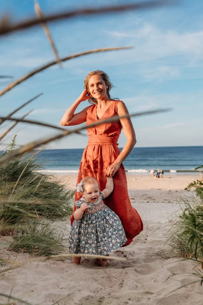 Plymouth Family Photographer Caryn Scanlan photographed this mom and her baby at a family photoshoot on a beach on the South Shore near Plymouth, MA