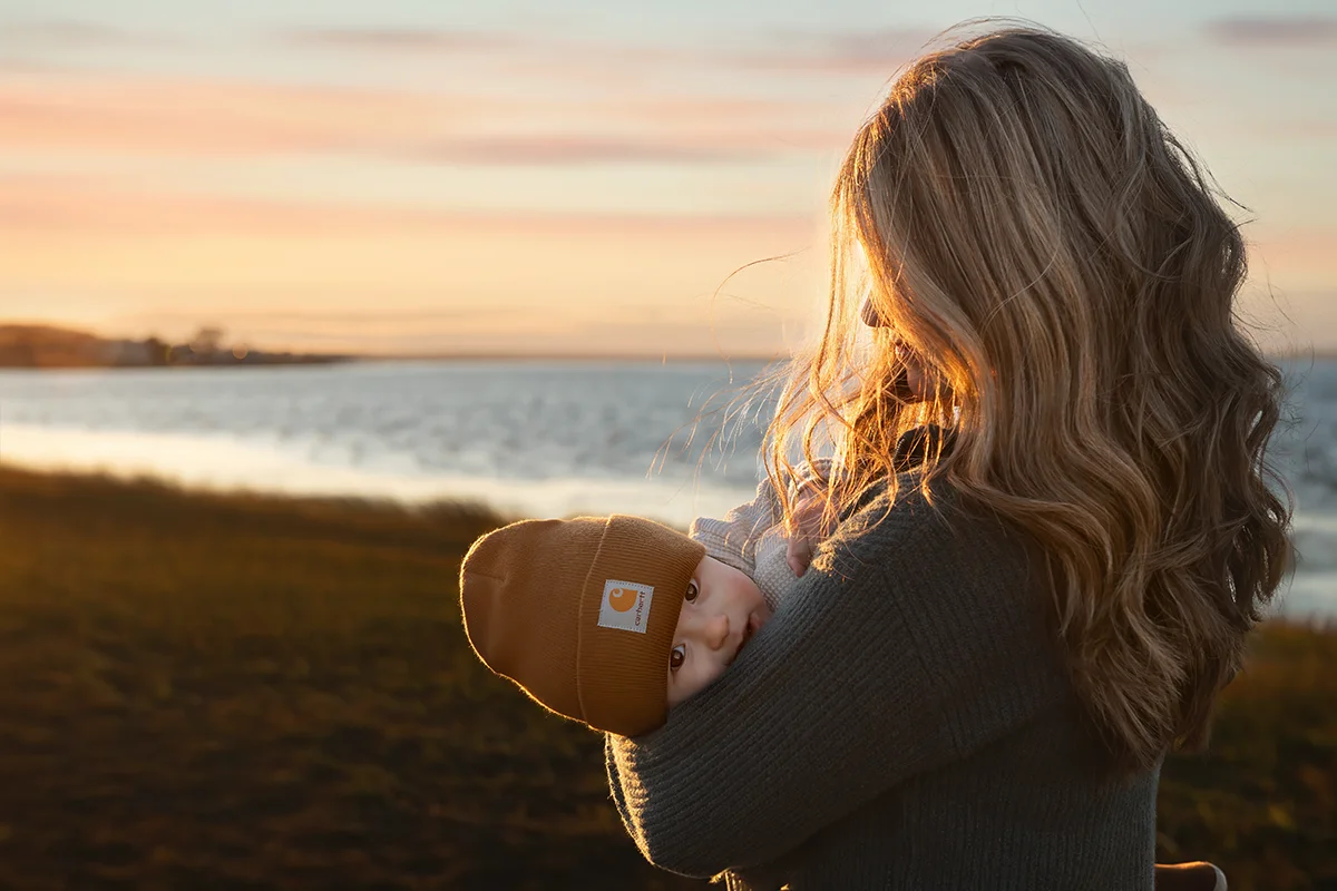 Cape Cod Family Photographer Caryn SCanlan with a mom and her baby at a family session