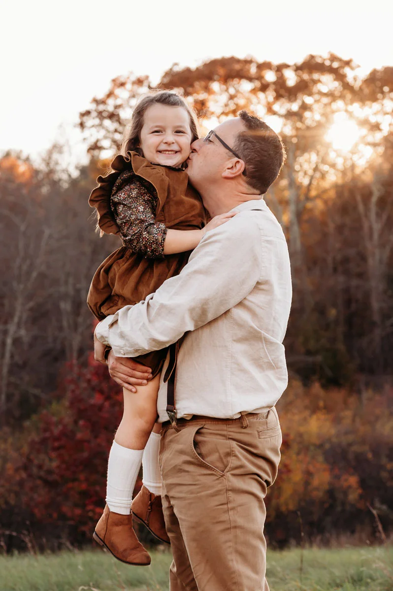 Plymouth Family Photographer Caryn Scanlan with a mom and her baby at a family session