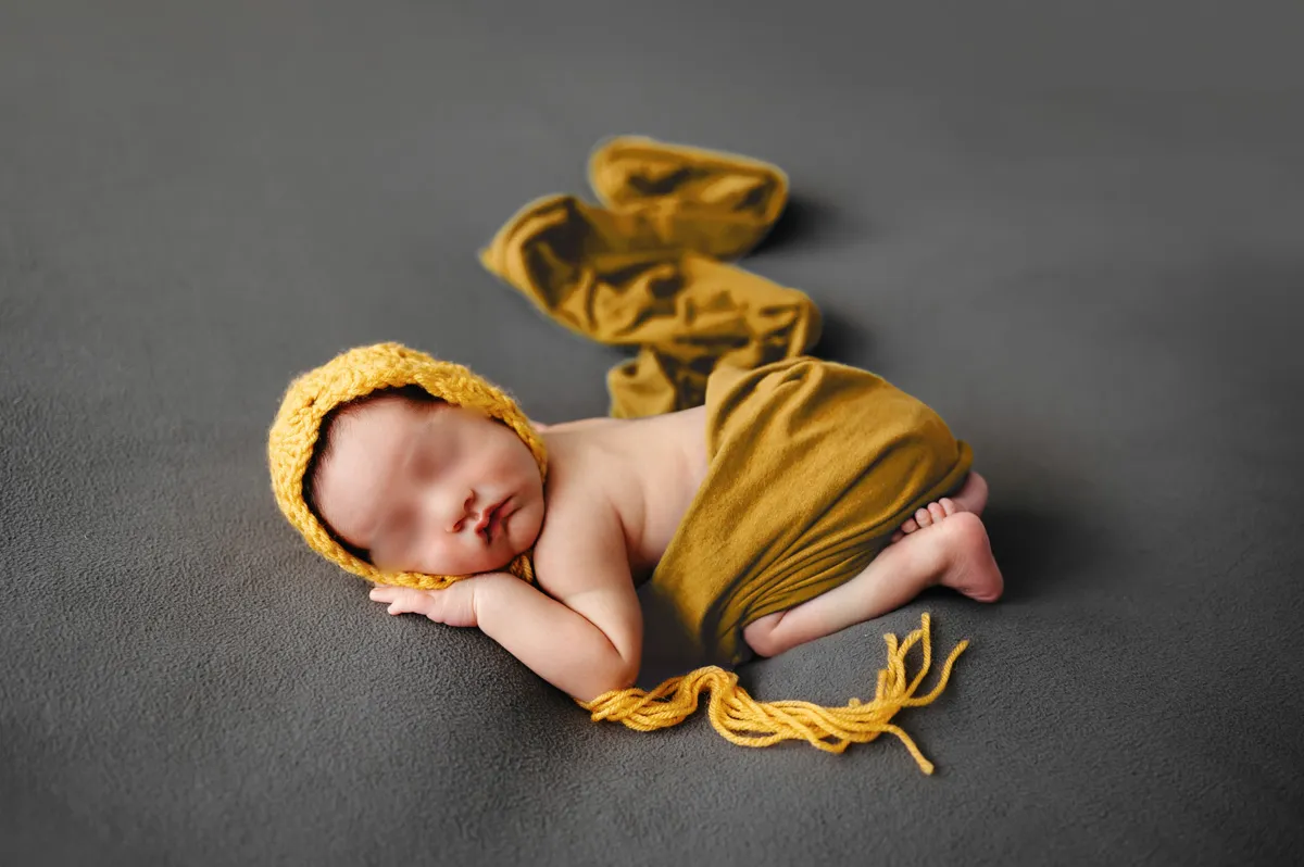 In-home newborn session in Boston by Caryn Scanlan in yellow