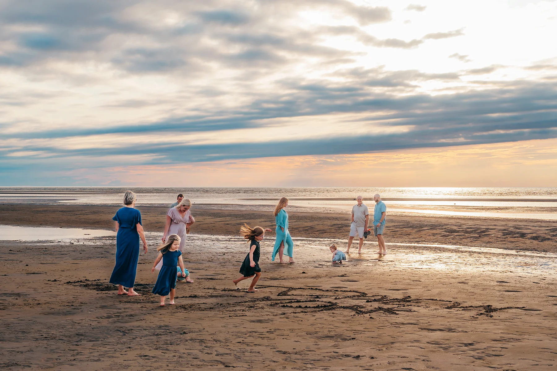 Caryn Scanlan Plymouth Cape Cod Family Photographer on the Beach on Cape Cod with young famliies