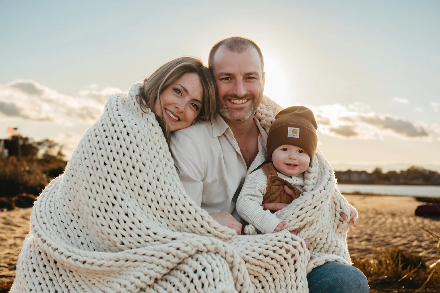 Cape Cof Family Photographer with a family on a blanket on the beach